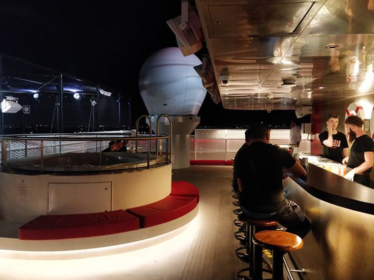 Virgin-Voyages-Scarlet-Lady-crew-Open-bar-with-jacuzzi.jpg